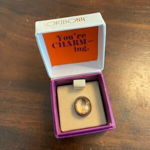 Lori Bonn Sterling Silver orange crystal with facets slide charm. Very sparkly.